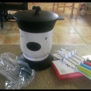 Electric fondue warmer.  New in box